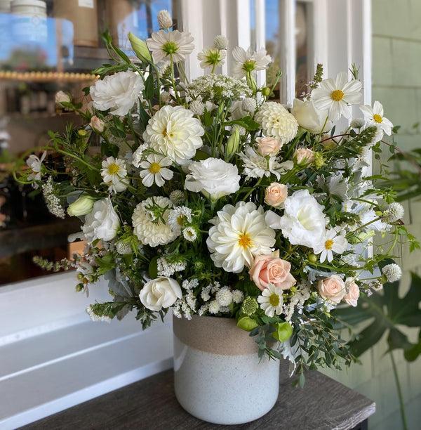 Extra Large White Flower Arrangement featuring dahlias, lisianthus, roses, ammi, cosmos, and more. 